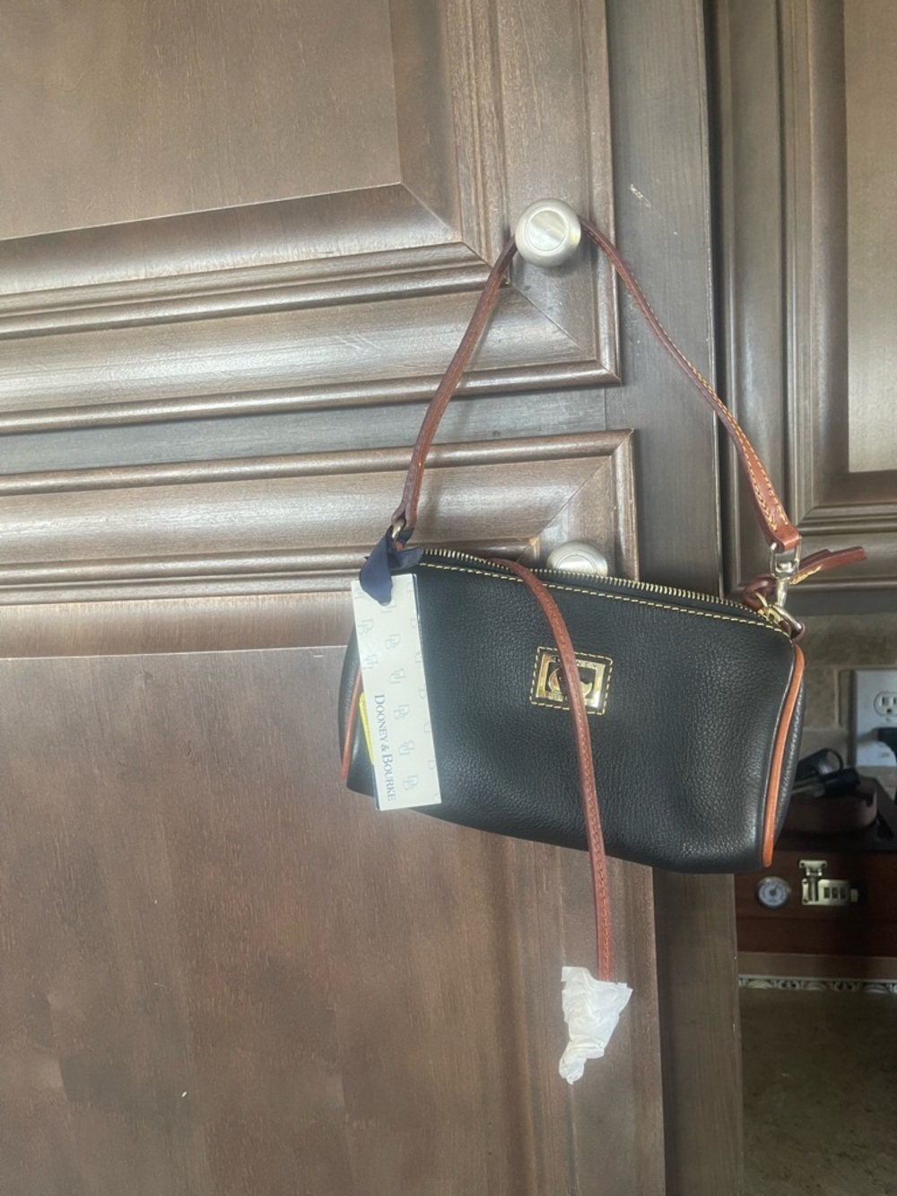 Dooney & Bourke Black Leather Mini Wristlet with Brown Trim